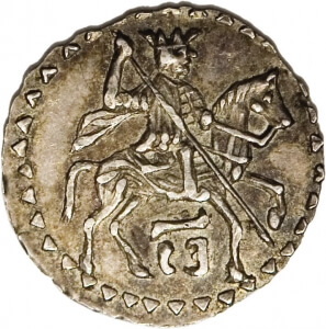 silver coin with man on horse