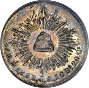 coin with liberty cap surrounded by rays